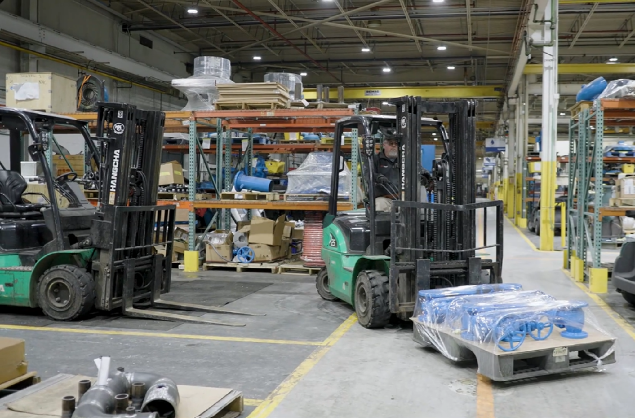 Forklift driver in warehouse